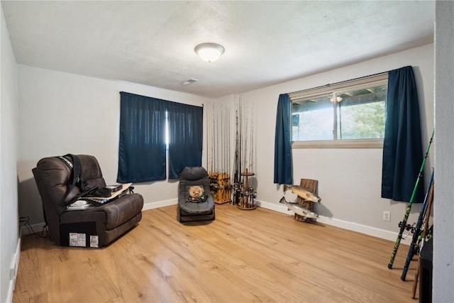 331 Lake View Dr NE, Solon, IA 52333 - sitting room featuring wood finished floors and baseboards