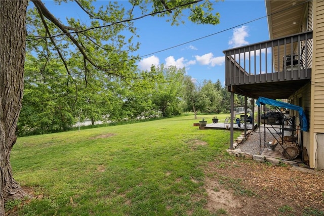 331 Lake View Dr NE, Solon, IA 52333 - view of green lawn featuring a patio area and view of scattered trees