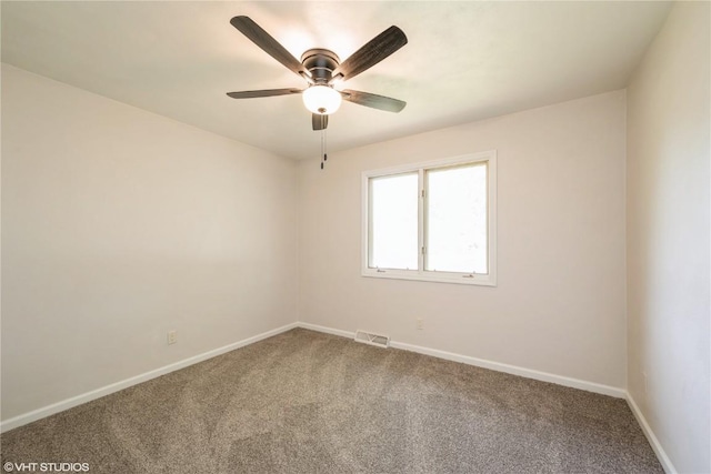 3099 27th Ave, Marion, IA 52302 - carpeted spare room featuring baseboards and a ceiling fan