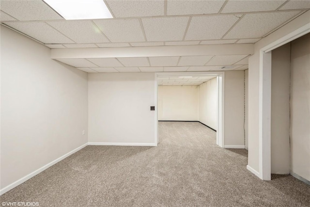 3099 27th Ave, Marion, IA 52302 - finished basement featuring carpet flooring, a drop ceiling, and baseboards