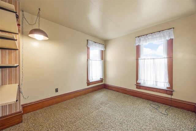 502 5th Ave, Clarence, IA 52216 - spare room featuring healthy amount of natural light and baseboards