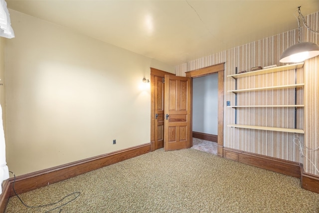 502 5th Ave, Clarence, IA 52216 - carpeted empty room with baseboards