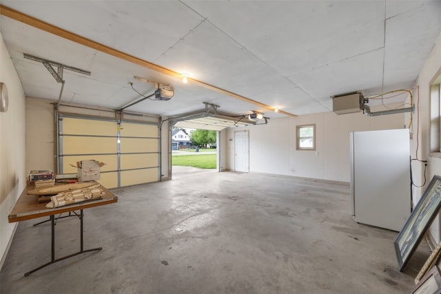 502 5th Ave, Clarence, IA 52216 - garage with freestanding refrigerator