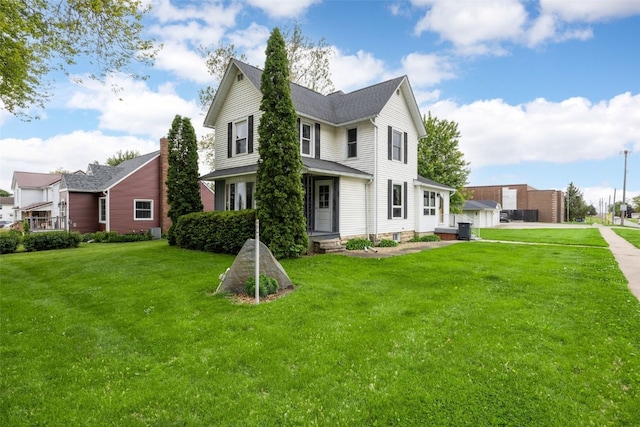 502 5th Ave, Clarence, IA 52216 - view of front facade featuring a front lawn