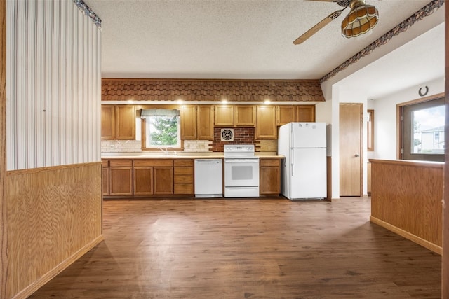 502 5th Ave, Clarence, IA 52216 - kitchen with white appliances, ceiling fan, tasteful backsplash, wood finished floors, and a textured ceiling