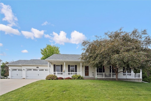 857 Shade Tree Ct, Lisbon, IA 52253 - single story home featuring a porch, an attached garage, concrete driveway, and a front lawn