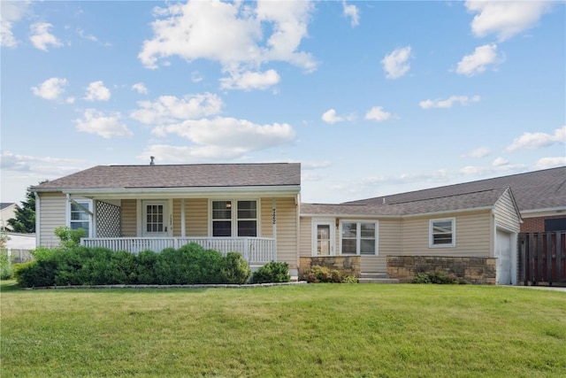 722 47th Ave, Amana, IA 52203 - ranch-style home with a garage, a porch, a front yard, and stone siding