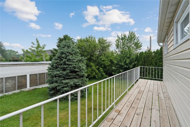 722 47th Ave, Amana, IA 52203 - deck featuring a yard