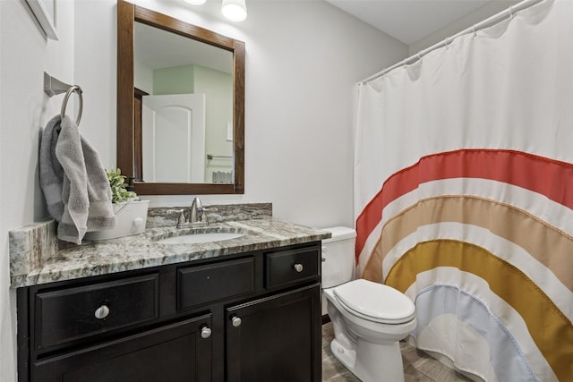 2106 Shady Grove Rd SW, Cedar Rapids, IA 52404 - bathroom with vanity and toilet