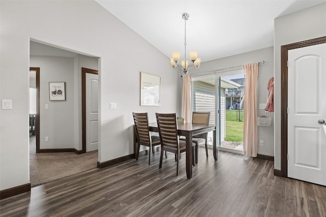 2106 Shady Grove Rd SW, Cedar Rapids, IA 52404 - dining room with a chandelier, dark wood-type flooring, baseboards, and vaulted ceiling
