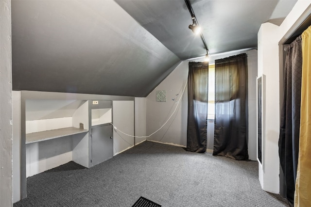 331 36th St NE, Cedar Rapids, IA 52402 - additional living space featuring carpet floors and vaulted ceiling
