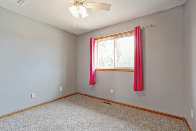 2445 Hillview Dr, Marion, IA 52302 - carpeted spare room with baseboards and a ceiling fan