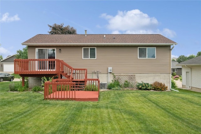 2445 Hillview Dr, Marion, IA 52302 - rear view of property with a wooden deck and a yard