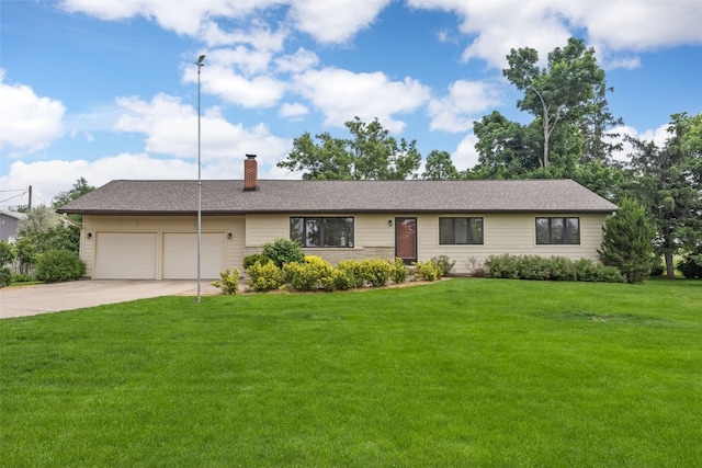 4519 Indian Creek Rd, Marion, IA 52302 - single story home with a garage, a chimney, driveway, and a front yard