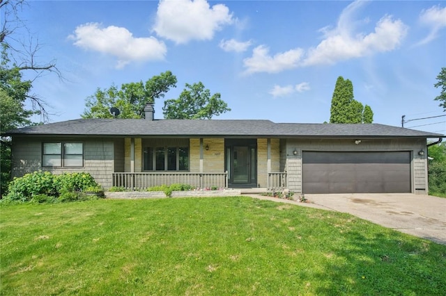 1649 Memorial Dr SE, Cedar Rapids, IA 52403 - single story home with a porch, a garage, a front yard, and driveway
