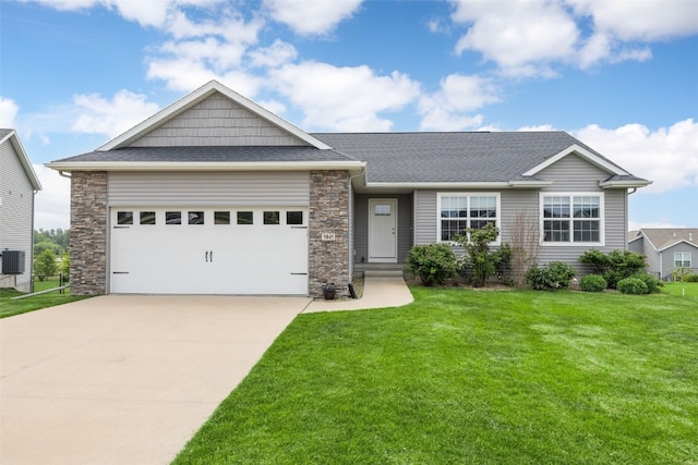 5045 Prairie Trl, Marion, IA 52302 - view of front of property with a front yard, driveway, a shingled roof, an attached garage, and cooling unit