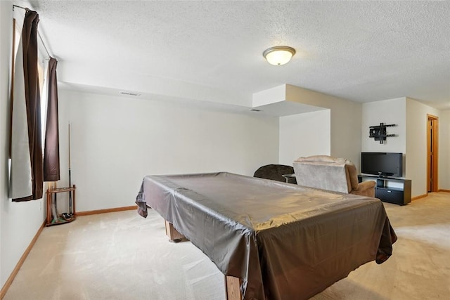 1450 Tower Ln NE, Cedar Rapids, IA 52402 - game room featuring light colored carpet, baseboards, a textured ceiling, and billiards