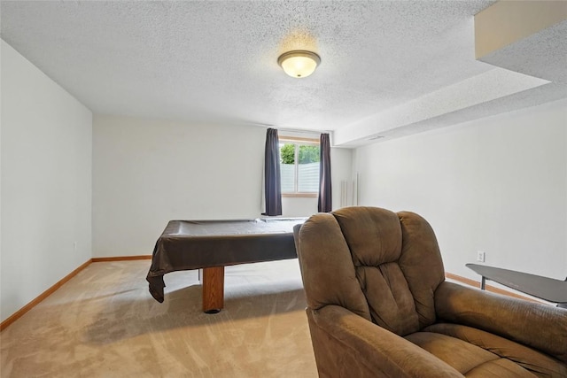 1450 Tower Ln NE, Cedar Rapids, IA 52402 - bedroom featuring baseboards, light carpet, a textured ceiling, and pool table