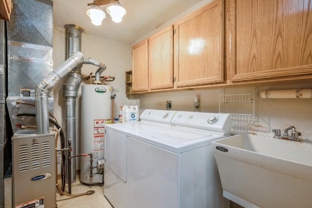 4320 Maureen Ct SE Unit 176, Cedar Rapids, IA 52403 - washroom with washer and clothes dryer, cabinet space, gas water heater, and heating unit
