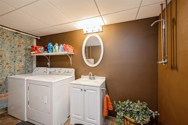 303 6th Ave, Newhall, IA 52315 - laundry area featuring washer and dryer and cabinet space