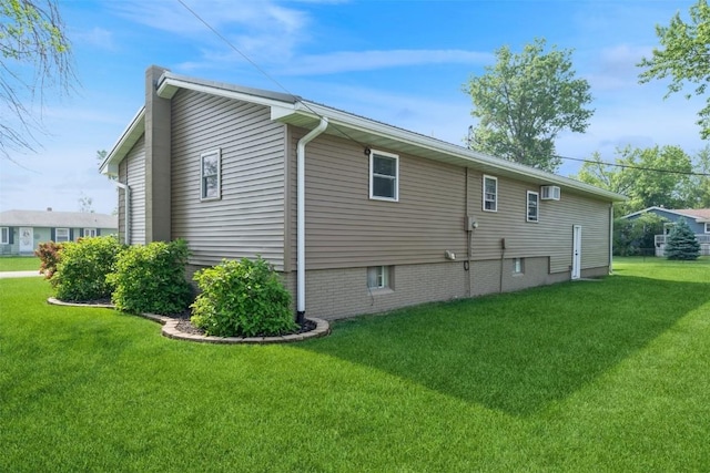 303 6th Ave, Newhall, IA 52315 - view of side of property featuring a lawn and an AC wall unit