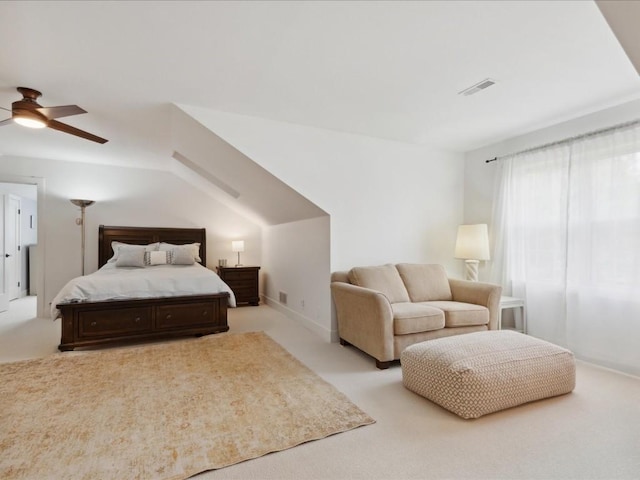 501 Washington Ct SW Unit B, Mount Vernon, IA 52314 - bedroom featuring carpet floors, lofted ceiling, and ceiling fan