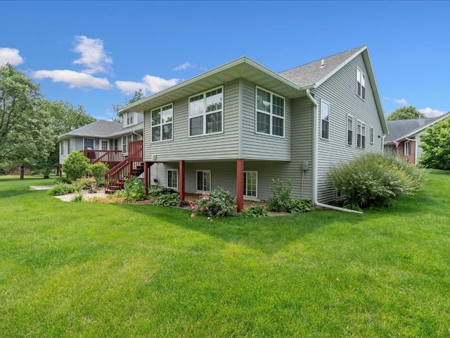 501 Washington Ct SW Unit B, Mount Vernon, IA 52314 - rear view of property with a yard