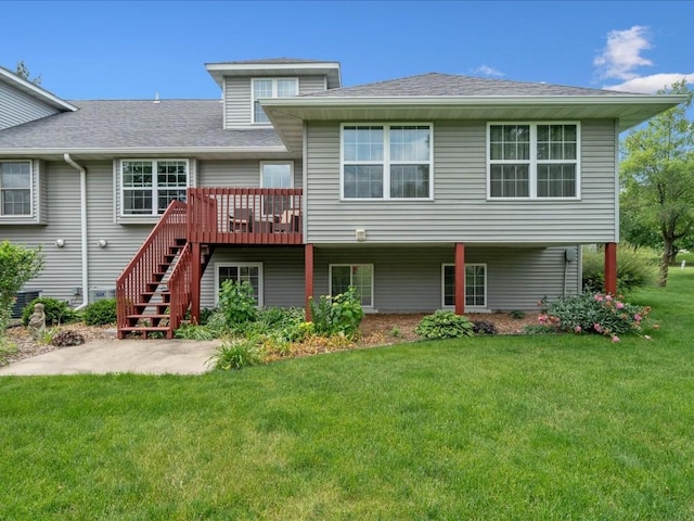 501 Washington Ct SW Unit B, Mount Vernon, IA 52314 - back of property with stairs, a deck, a yard, and a shingled roof