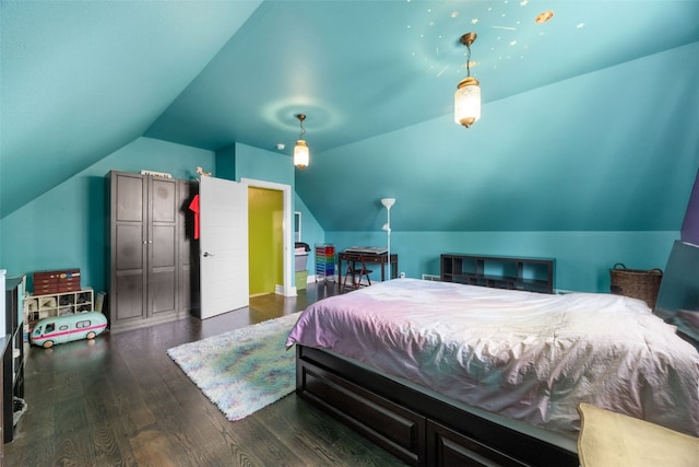 508 W 5th St, Vinton, IA 52349 - bedroom with vaulted ceiling and wood finished floors