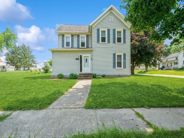 207 Prospect St NW, Blairstown, IA 52209 - traditional home featuring a front yard and entry steps