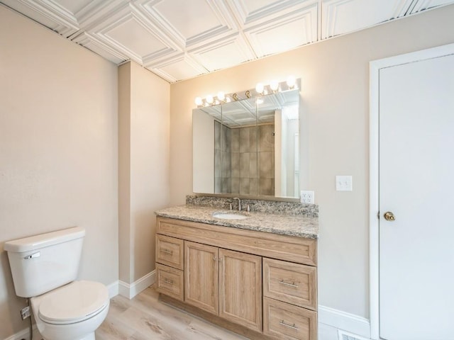 207 Prospect St NW, Blairstown, IA 52209 - bathroom with vanity, wood finished floors, and tiled shower