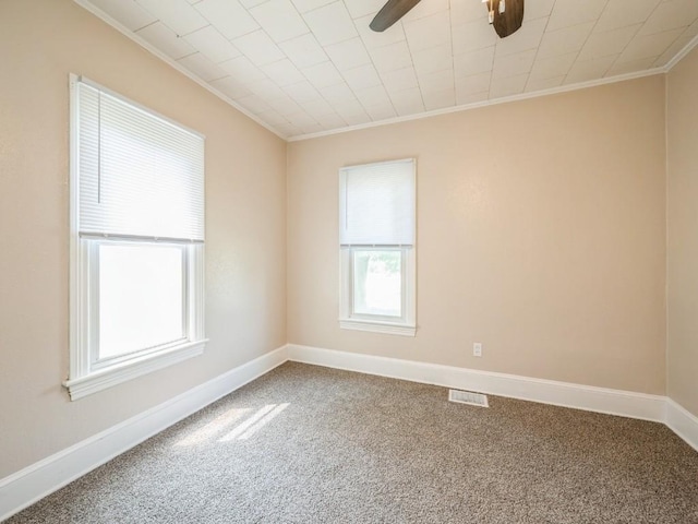 207 Prospect St NW, Blairstown, IA 52209 - carpeted spare room with ornamental molding and ceiling fan