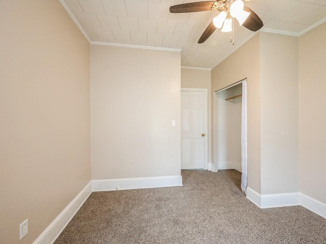 207 Prospect St NW, Blairstown, IA 52209 - unfurnished bedroom featuring ornamental molding, carpet floors, and a ceiling fan