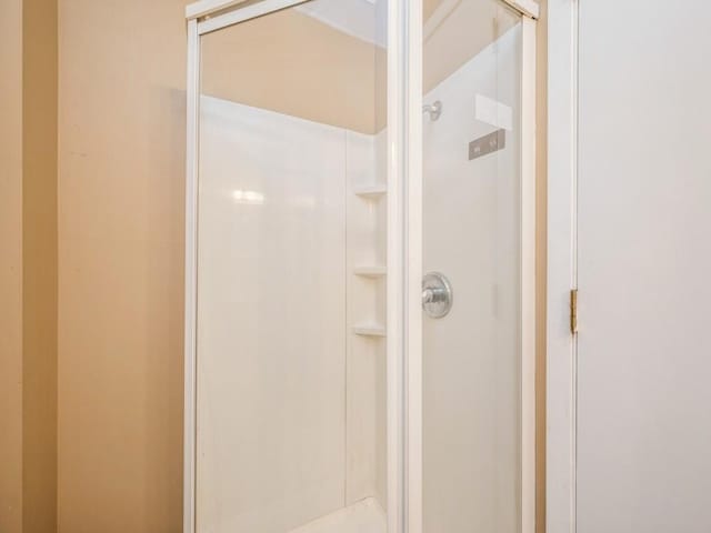 207 Prospect St NW, Blairstown, IA 52209 - full bath featuring a shower stall