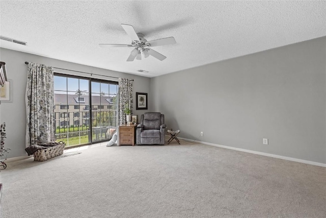 130 Thompson Dr SE Unit 320, Cedar Rapids, IA 52403 - unfurnished room featuring carpet flooring, a textured ceiling, and ceiling fan