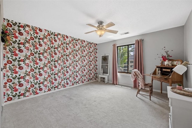 130 Thompson Dr SE Unit 320, Cedar Rapids, IA 52403 - office area featuring a ceiling fan and light carpet