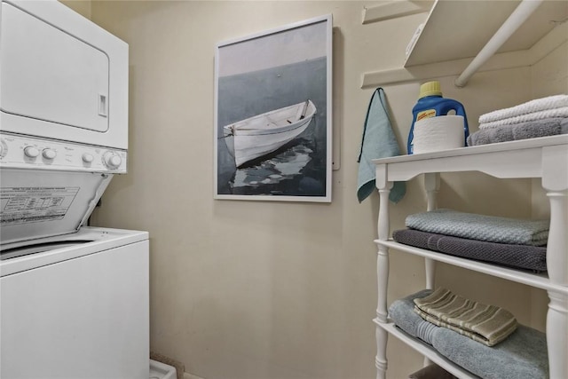 130 Thompson Dr SE Unit 320, Cedar Rapids, IA 52403 - washroom featuring stacked washing machine and dryer