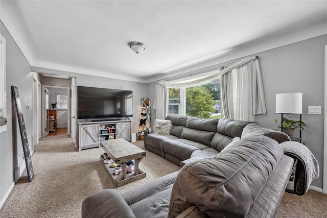 3622 14th Ave SE, Cedar Rapids, IA 52403 - carpeted living area featuring baseboards