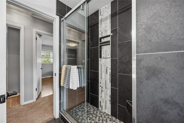 3622 14th Ave SE, Cedar Rapids, IA 52403 - full bath featuring a stall shower and baseboards