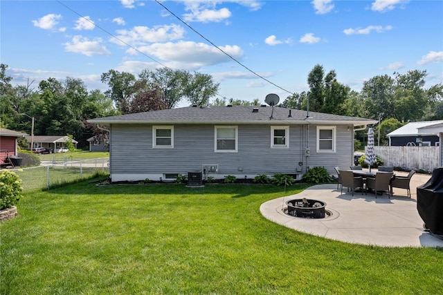 3622 14th Ave SE, Cedar Rapids, IA 52403 - rear view of property with a fire pit and a patio area