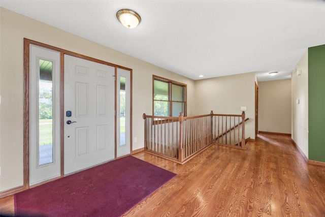 660 Garfield Rd, West Branch, IA 52358 - foyer entrance featuring wood finished floors and baseboards