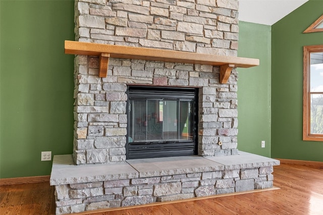 660 Garfield Rd, West Branch, IA 52358 - detailed view of a fireplace and wood finished floors