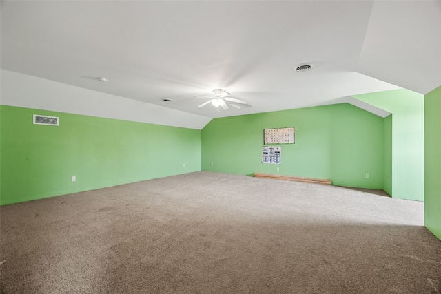 660 Garfield Rd, West Branch, IA 52358 - bonus room featuring lofted ceiling, carpet flooring, and a ceiling fan