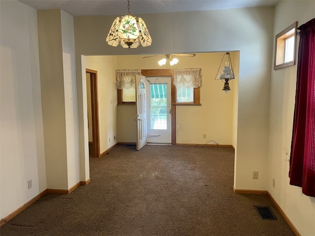 820 10th St NW, Cedar Rapids, IA 52405 - unfurnished dining area with a ceiling fan and carpet flooring