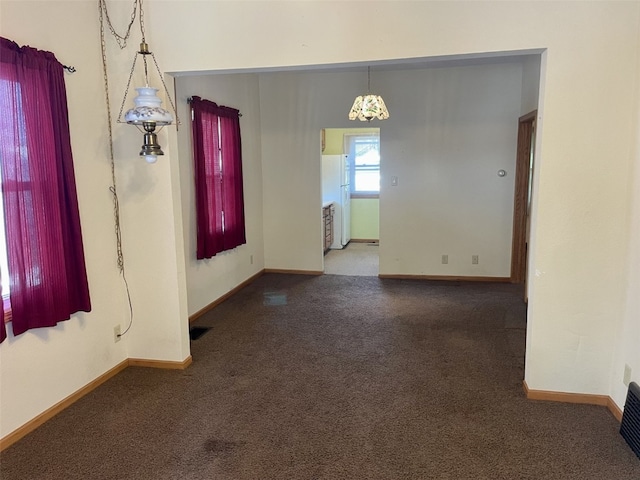 820 10th St NW, Cedar Rapids, IA 52405 - carpeted empty room with baseboards