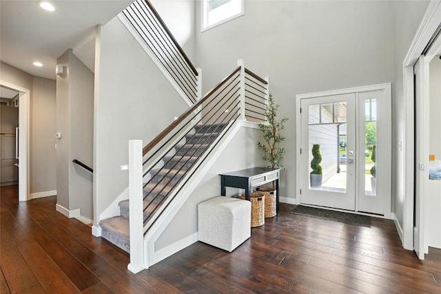 1643 Avalon Pl, Iowa City, IA 52245 - foyer entrance featuring hardwood / wood-style flooring, a towering ceiling, recessed lighting, and stairs