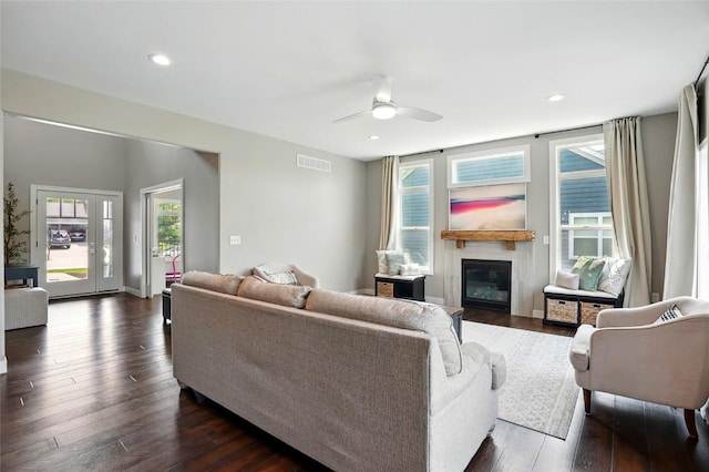 1643 Avalon Pl, Iowa City, IA 52245 - living room featuring ceiling fan, a glass covered fireplace, dark wood-type flooring, and recessed lighting