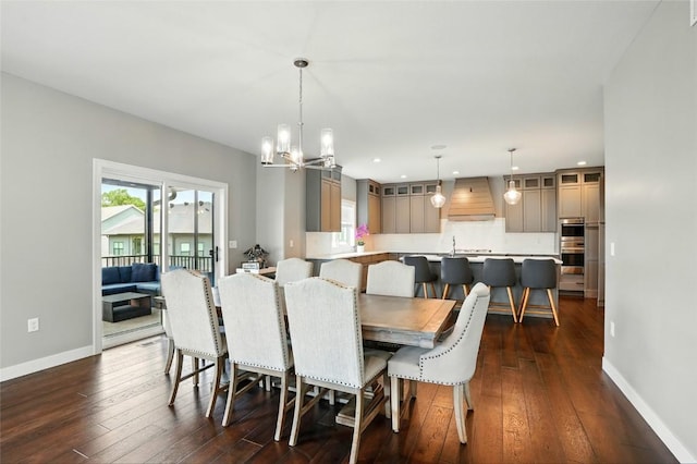 1643 Avalon Pl, Iowa City, IA 52245 - dining area featuring dark wood finished floors, a chandelier, and recessed lighting