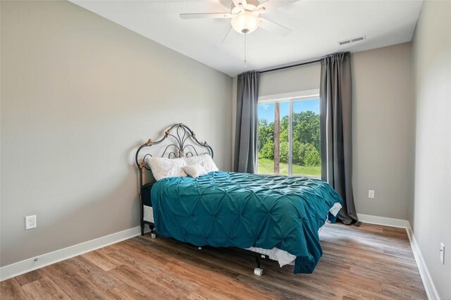 1643 Avalon Pl, Iowa City, IA 52245 - bedroom featuring wood finished floors and ceiling fan