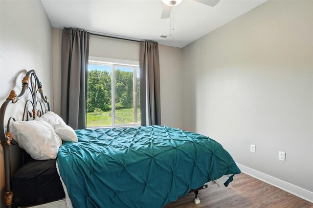 1643 Avalon Pl, Iowa City, IA 52245 - bedroom with wood finished floors and ceiling fan